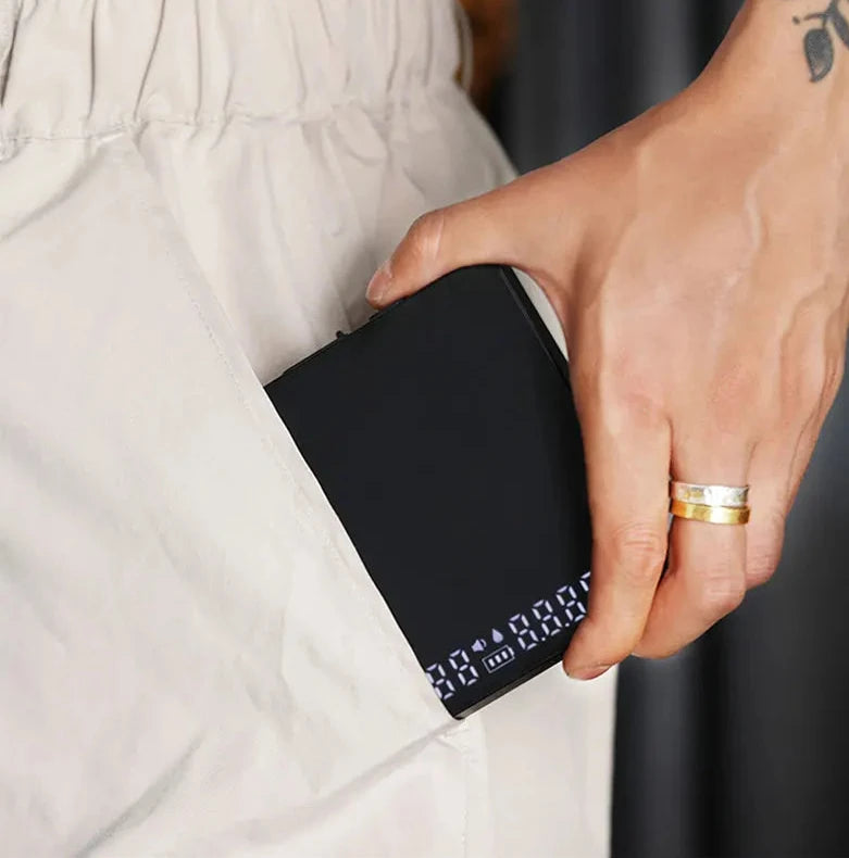 Compact black coffee bean scale with automatic timer