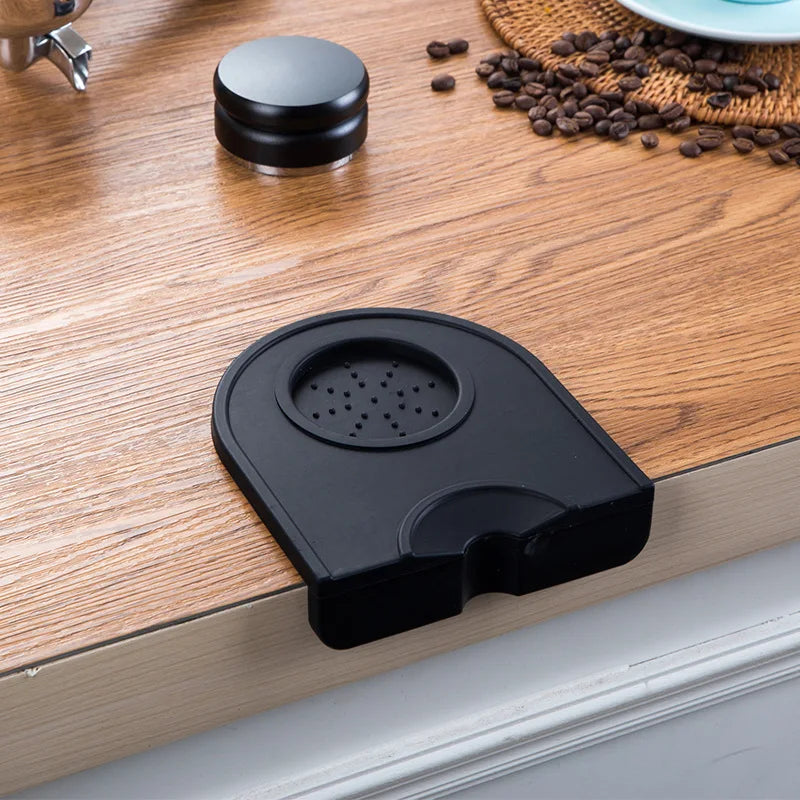 Small black silicone coffee tamping mat