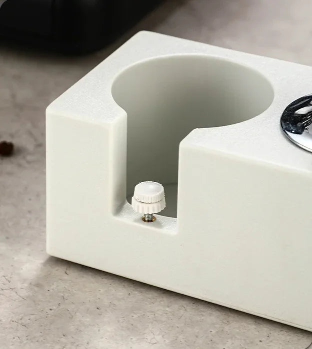 Adjustable height for portafilter and coffee tamper station