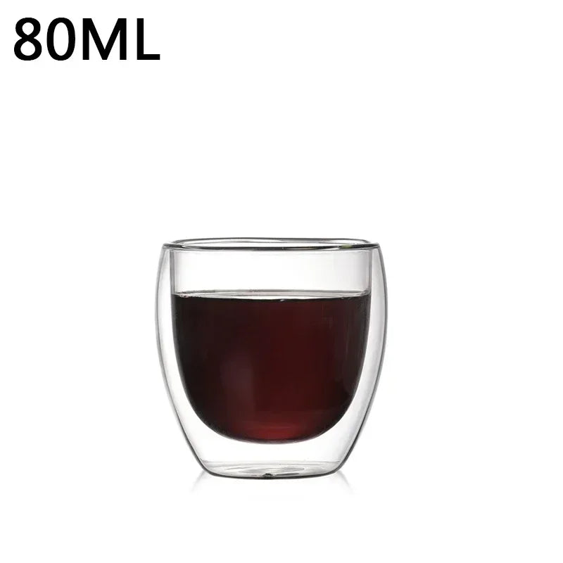 Clear double wall glass with coffee liquid on a white background, labeled '80ML'.