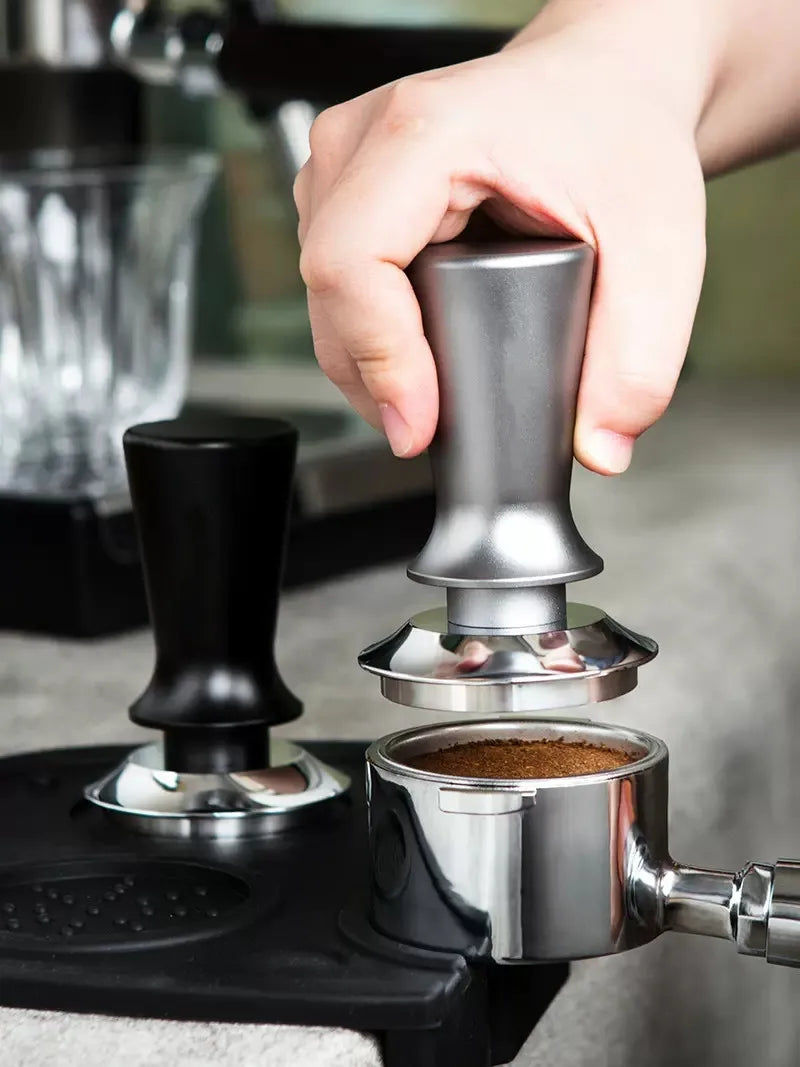 Solid silver and black constant pressure click coffee tamper